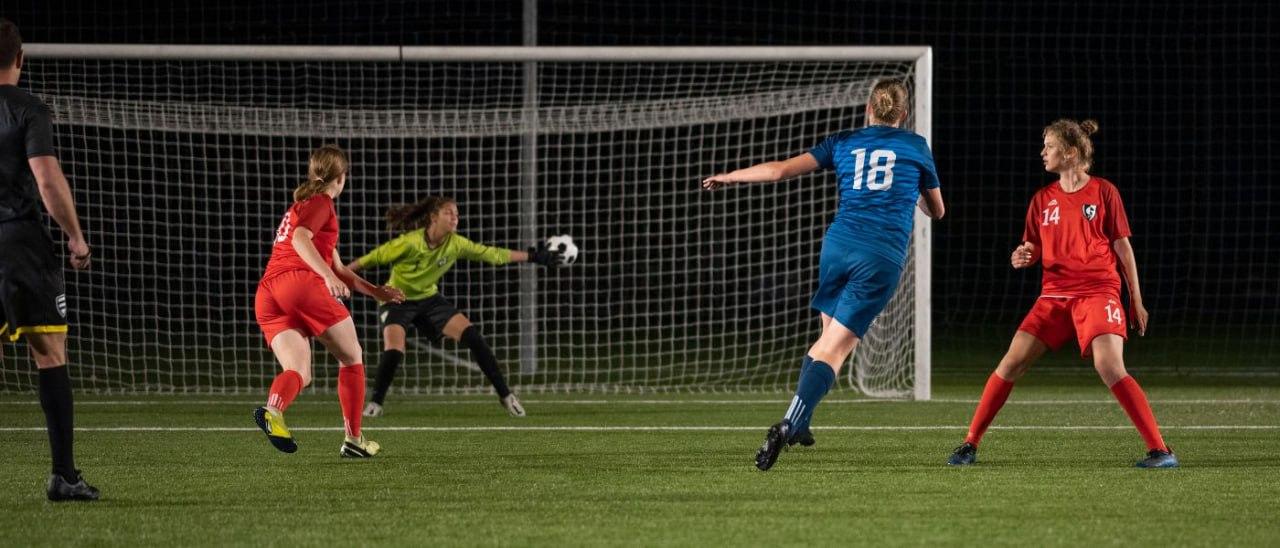 Woman scoring a first goal